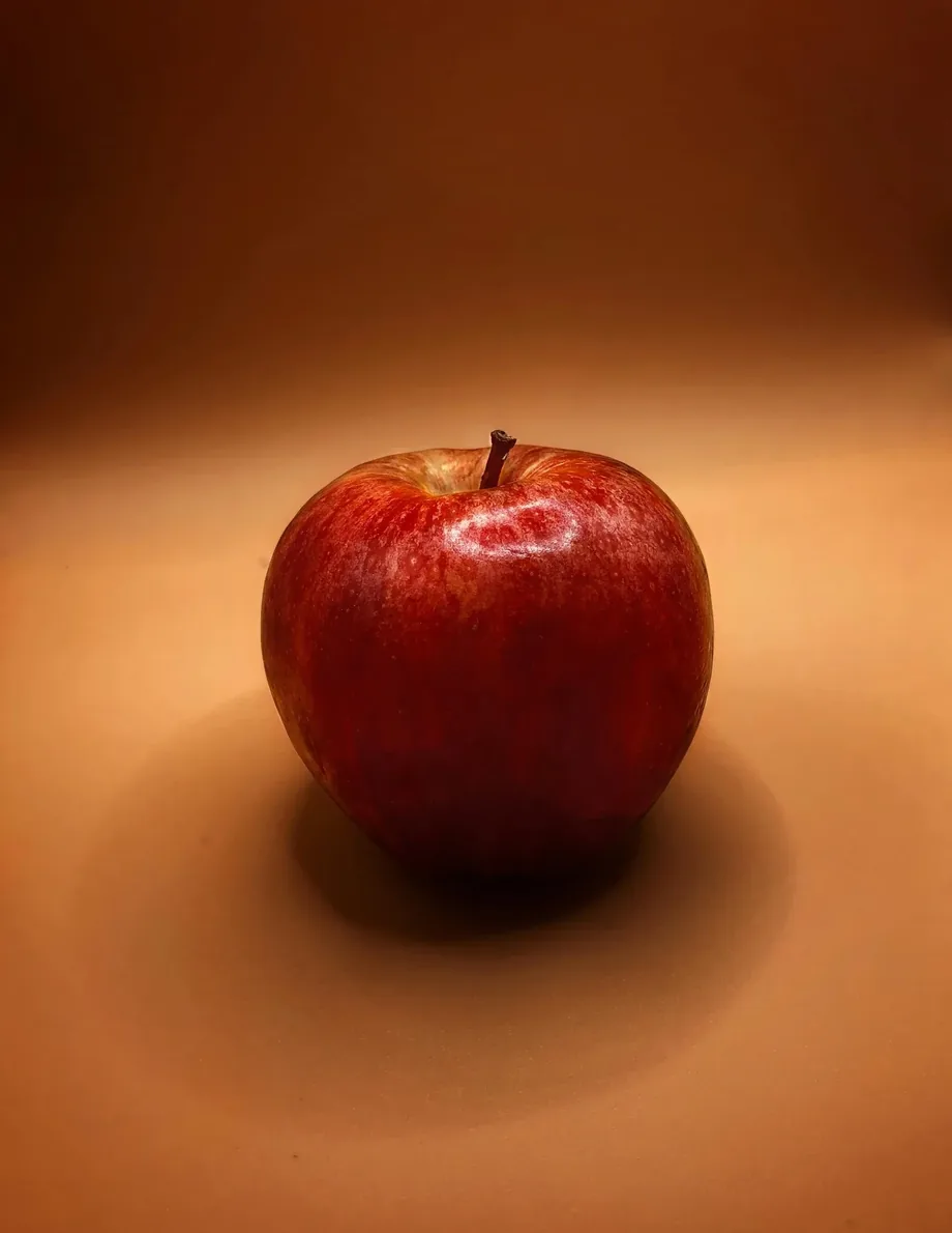 Apple cider vinegar photographed with a Burntide jar on an amber background